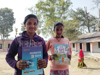 Students with library books at Middle School Fulbari