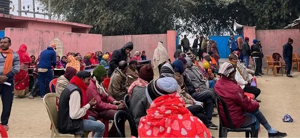 Gathering of villagers to highlight the impact of education at
                  Primary School Fulbari, Nai Tola.
